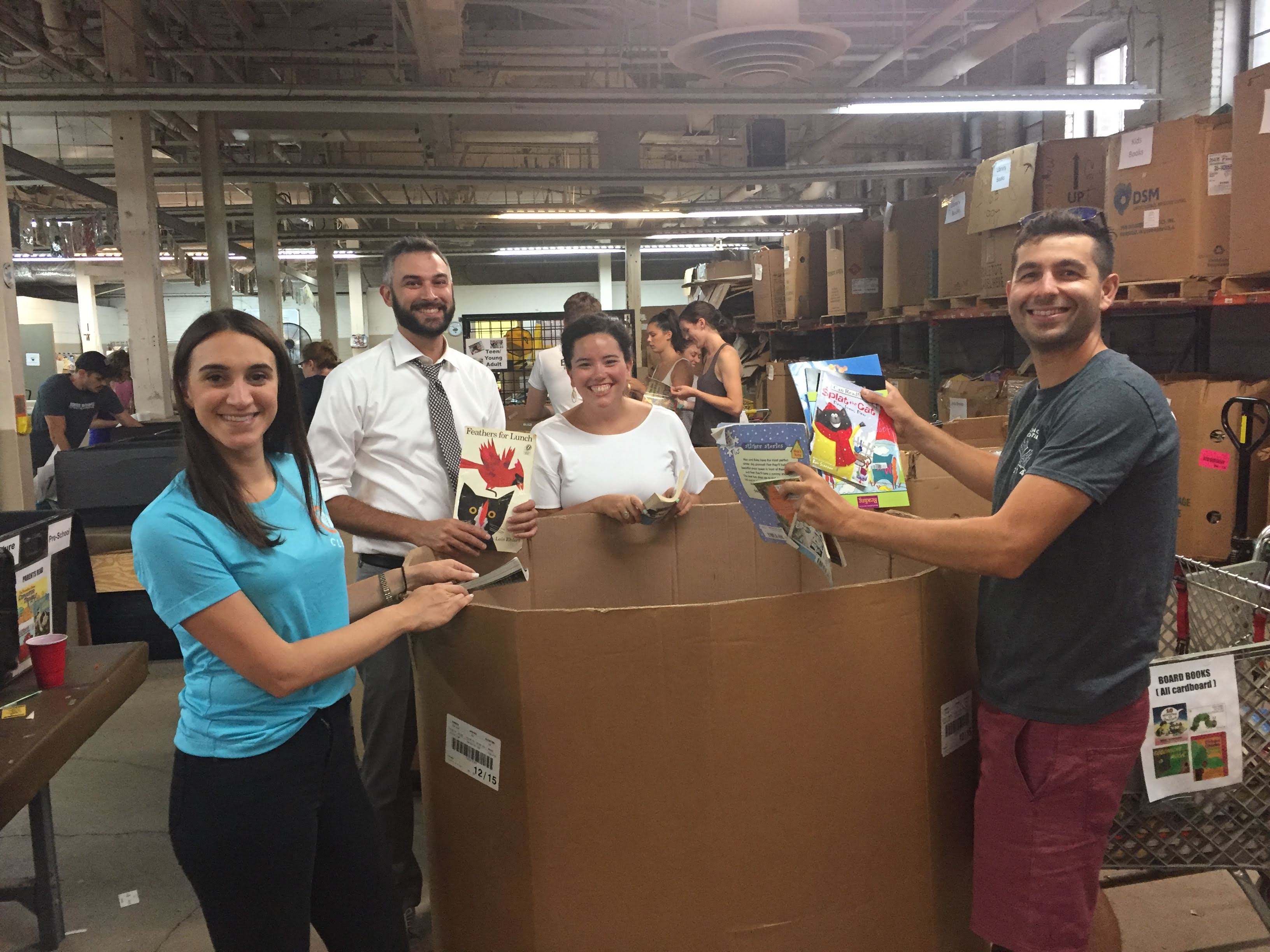 Cleveland Kids' Book Bank Young Professionals sort books