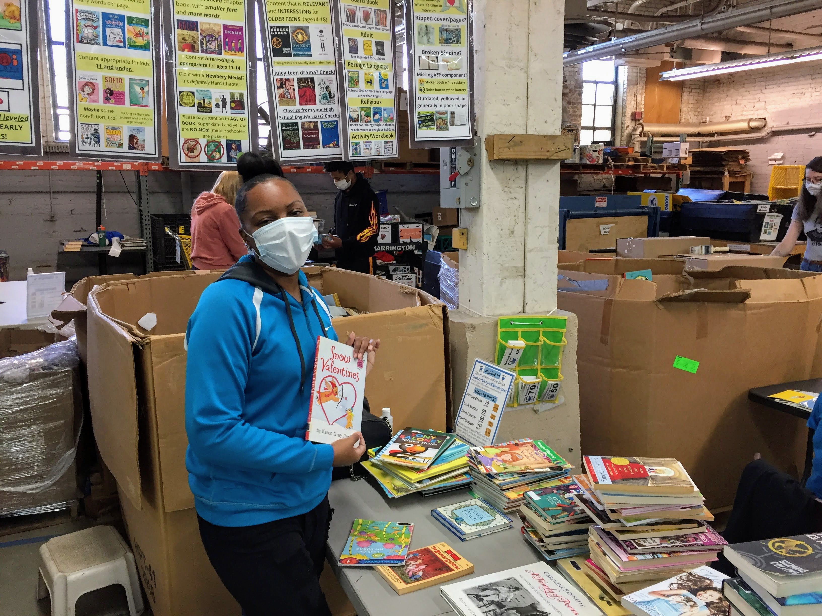 IMG_5098 Cleveland Kids' Book Bank volunteer packing books